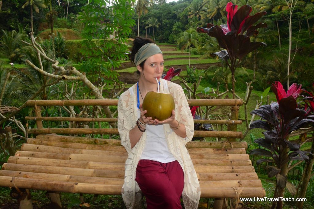 buying coconut from local farmer Tegalalang Ubud Bali