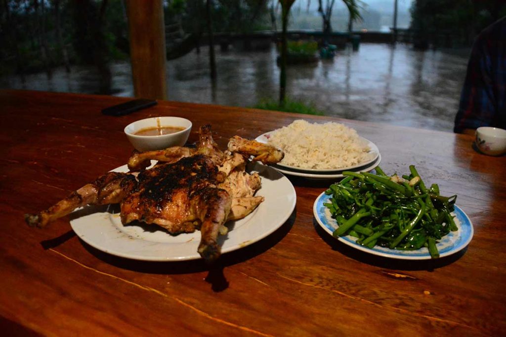 Phong Nha, Vietnam Chicken with Peanut Sauce at Pub With Cold Beer