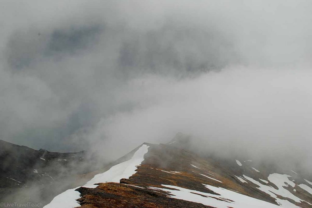 Pepper Peak clouds and mist shrouding the summit and slopes of Pepper Peak
