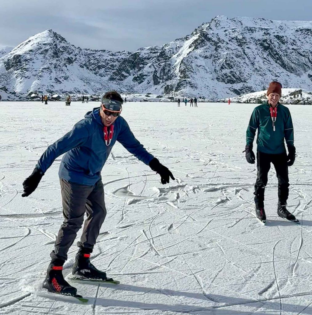 Weston Heated Glove Liners Mike Still and a friend ice skating outdoors in Alaska’s winter landscape