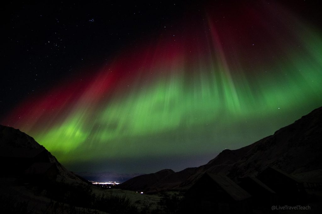 Weston Heated Glove Liners Northern lights glowing in the night sky