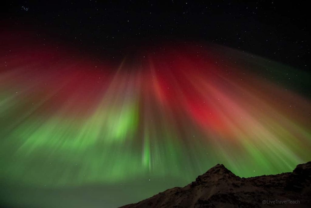 Chasing The Northern Lights Aurora borealis glowing at night