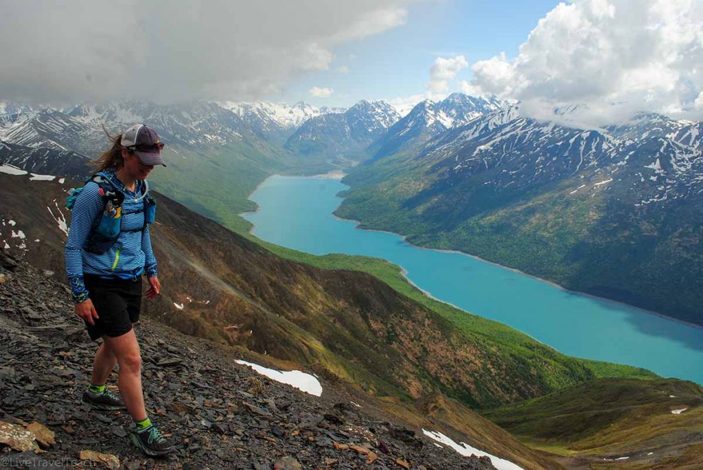 Pepper Peak a hiker on the Twin Peaks Trail overlooking Eklutna Lake