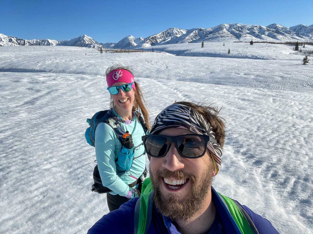 Crust Skiing Mike and Elizabeth in Denali State Park during winter