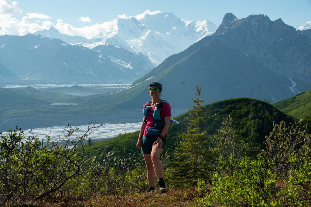 Elizabeth poses with Blackburn Mountain in the background along the Bonanza Mine Trail