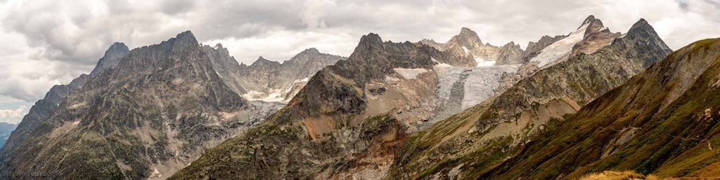 Tour du Mont Blanc a panoramic view of the rugged peaks and glaciers within the Mont Blanc massif