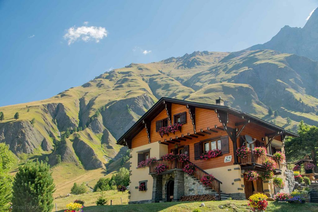 Tour du Mont Blanc a traditional alpine chalet nestled in a lush mountainous landscape