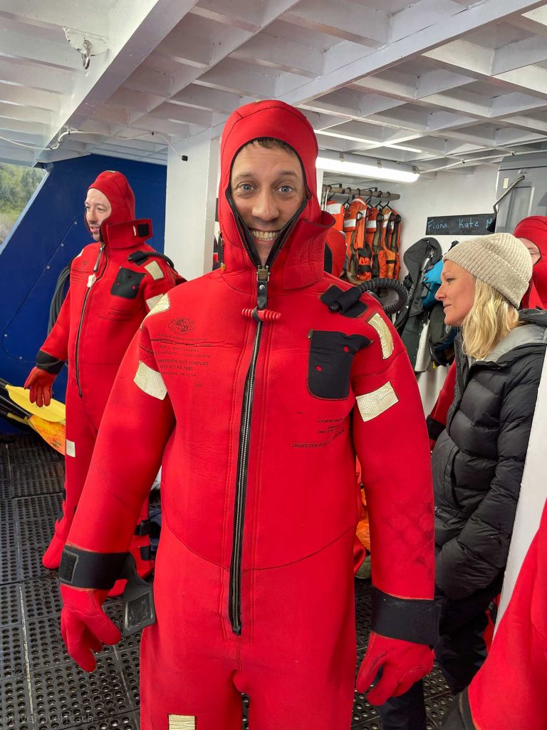 Kenai Fjords Kayak Mike Still wearing an immersion suit