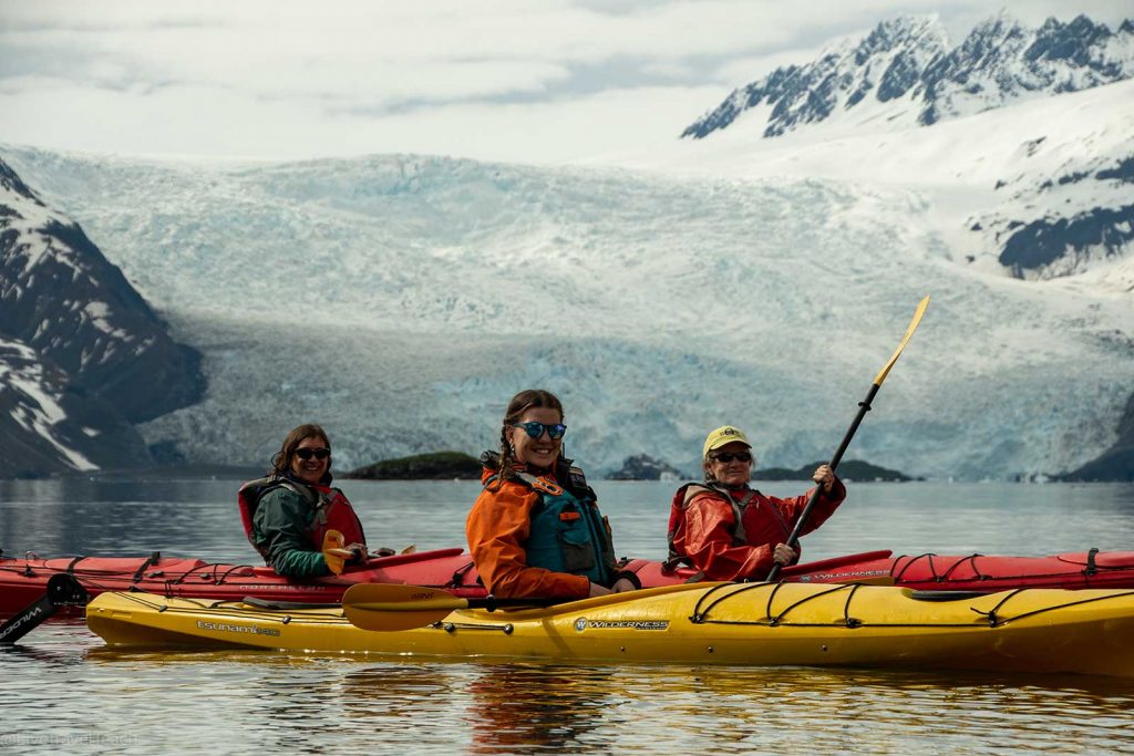 Aialik Glacier Kayaking Women kayaking in Aialik Bay