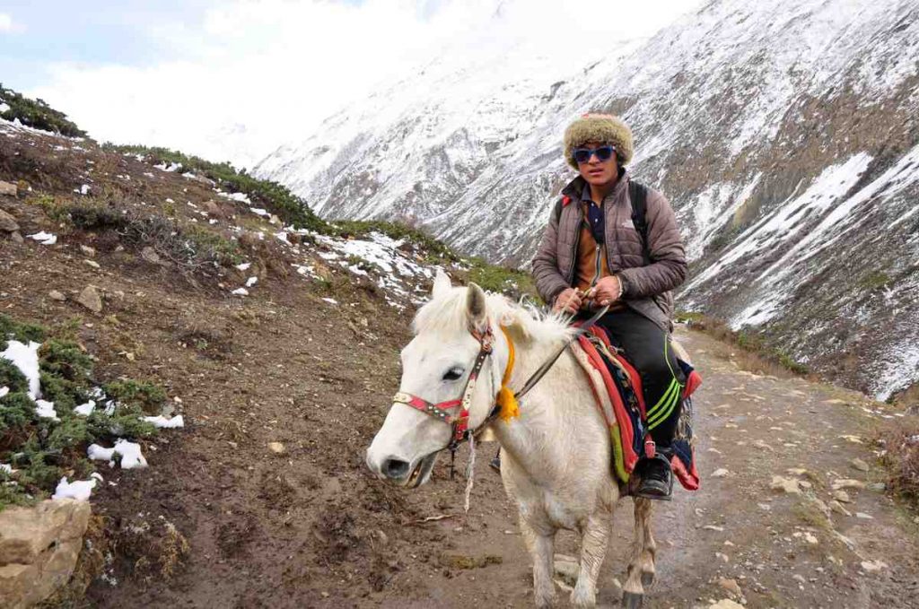 a man riding a horse